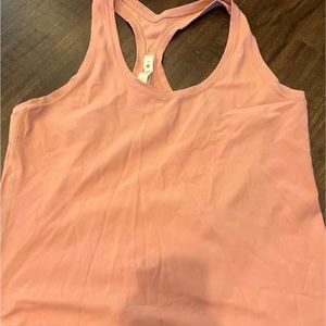 lululemon cool raceback tank top peach ish color nulu size 14